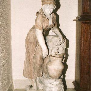 lip ženske ob studencu